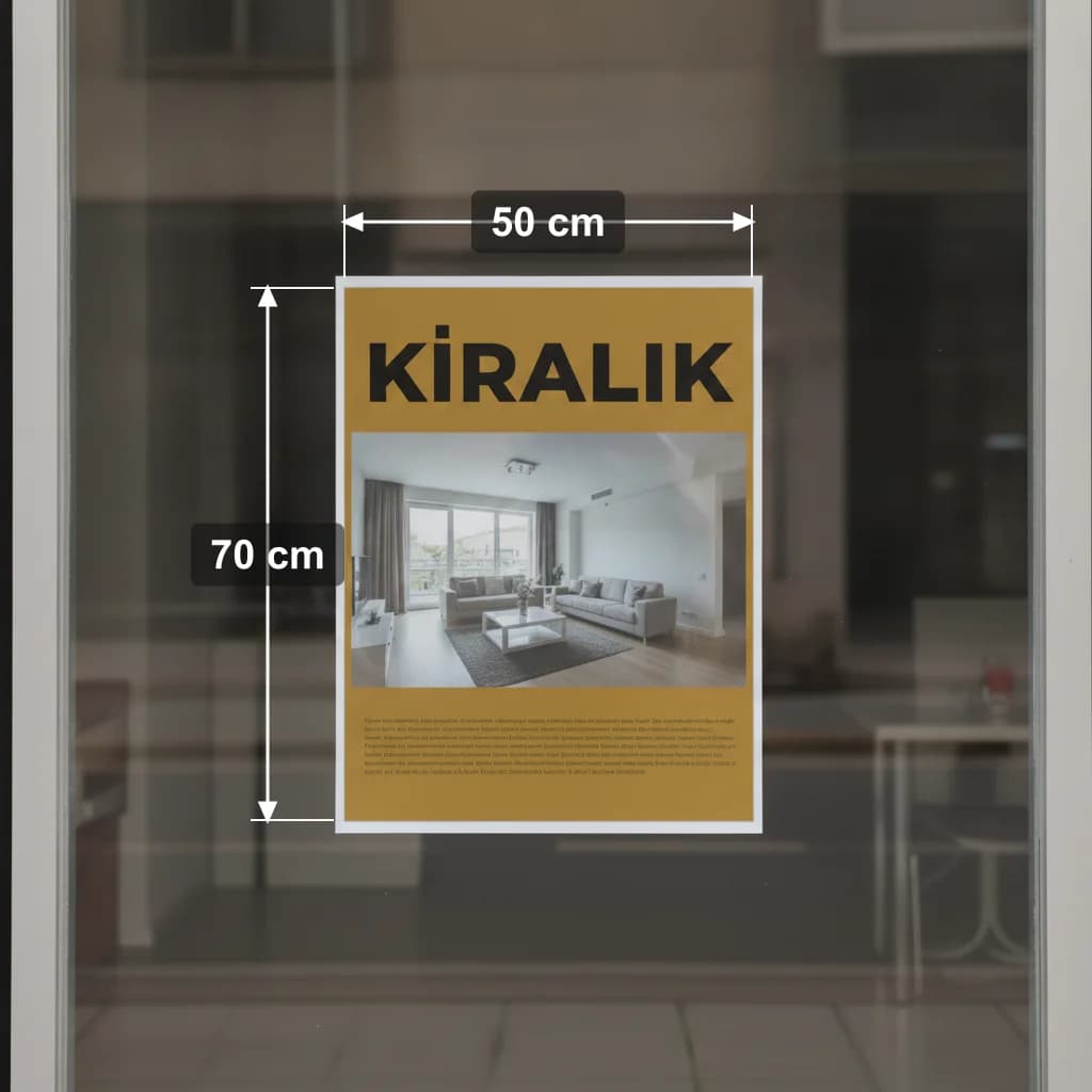 Dükkan vitrinine asılmış 50 x 70 cm kiralık afişi, ölçüleriyle